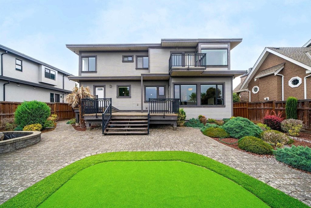 Richmond backyard landscaping with oriental-style plants, sloped walkways, and a custom landscape design.